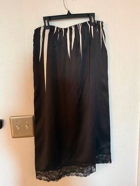 McQueen Black Midi Slip Skirt with Ivory Spike Detail and Lace Hemline